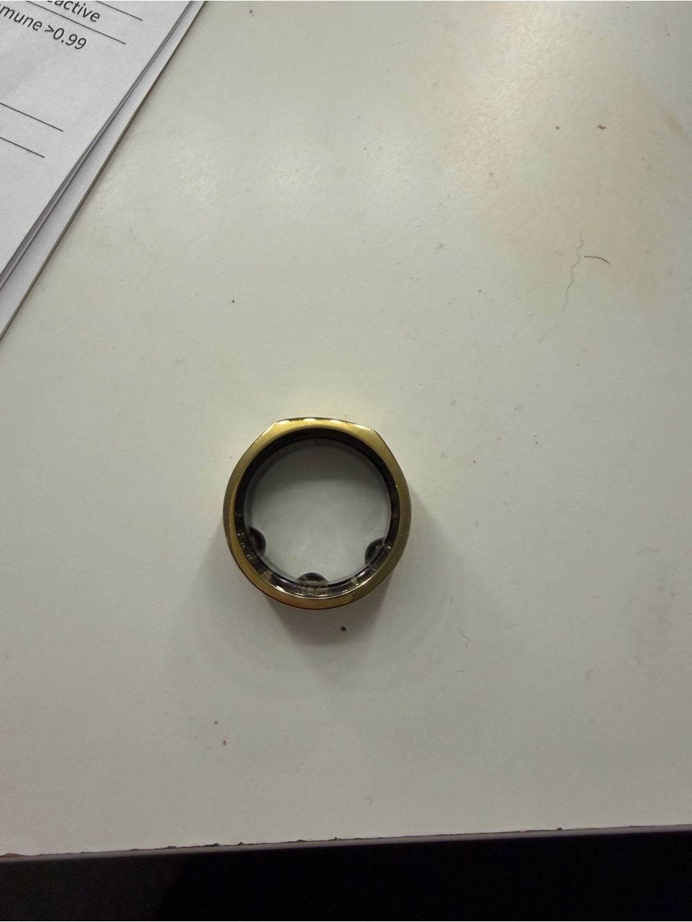 Oura Gold and Black Smart Ring